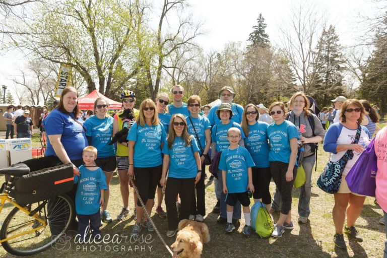 group posing for photo at Cystic Fibrosis Great Strides walk in minneapolis mn
