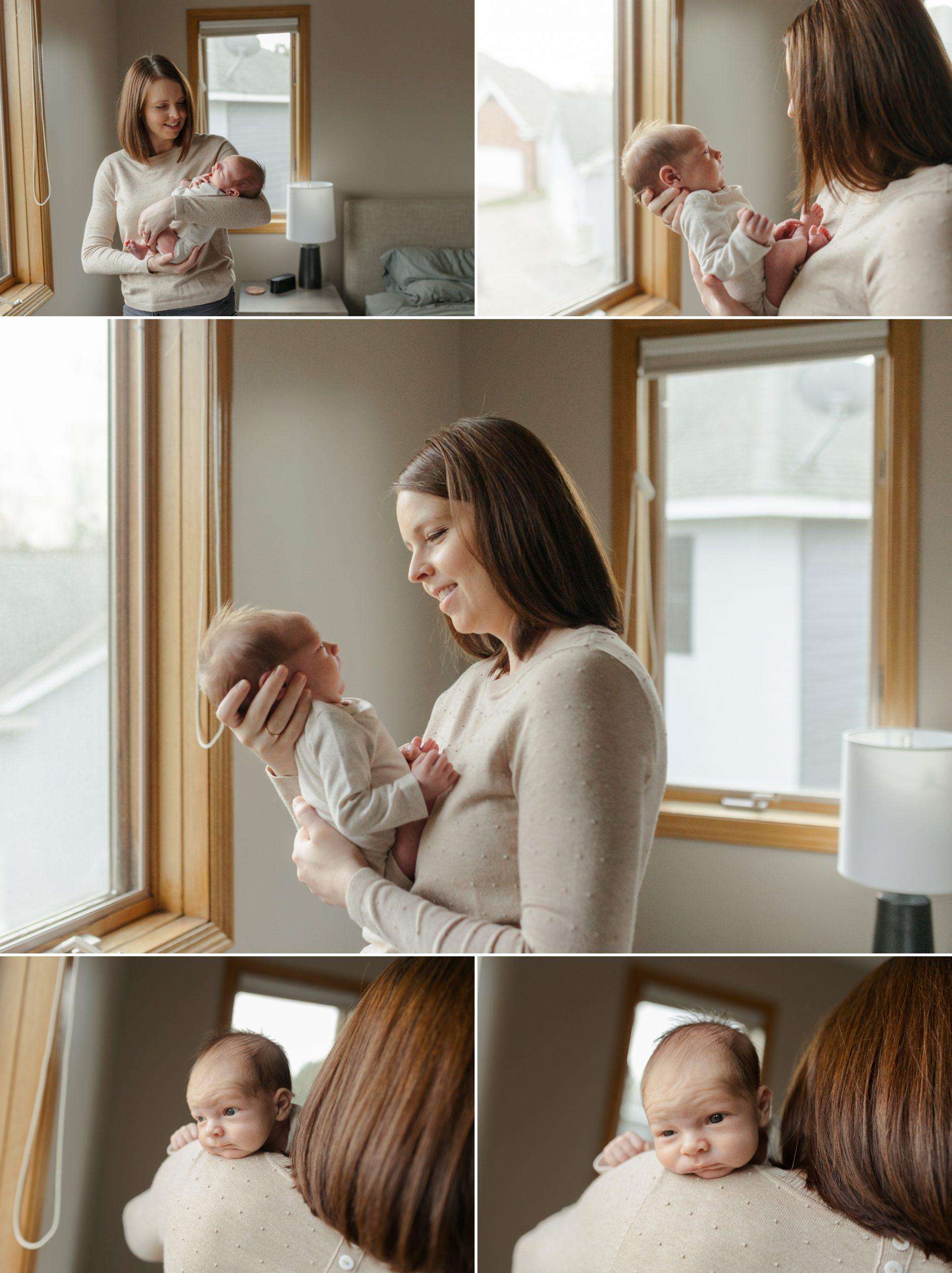 mom and dad posing with their newborn baby in shoreview, mn