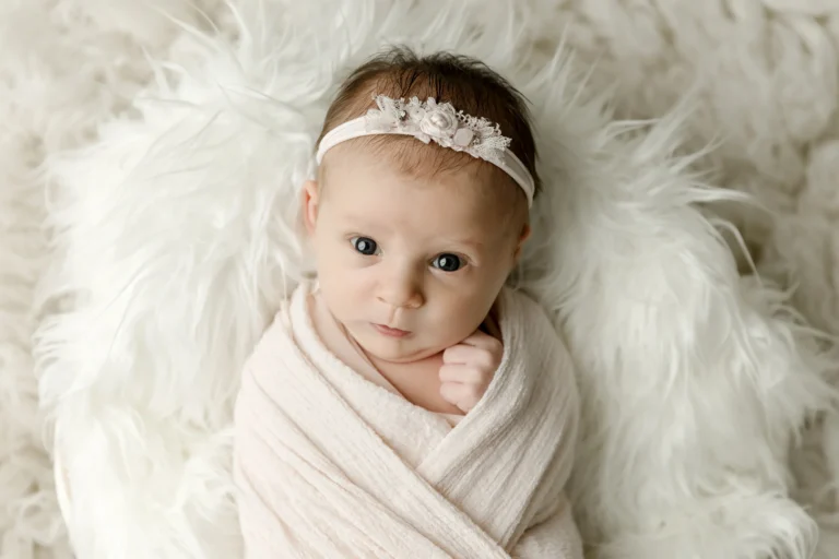 wide awake newborn wrapped in pink with roseville mn newborn photographer