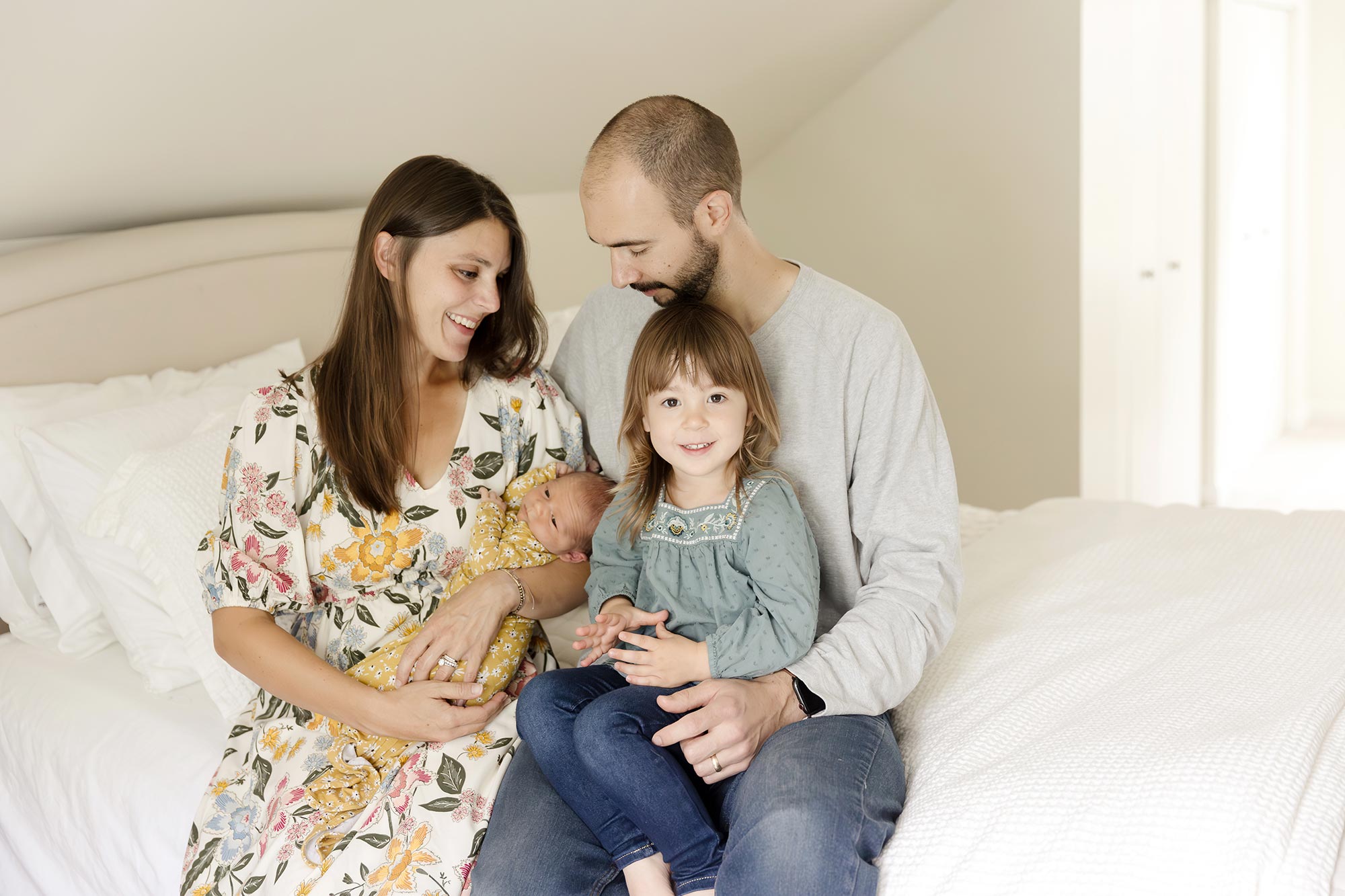 family of four with newborn at home in edina mn