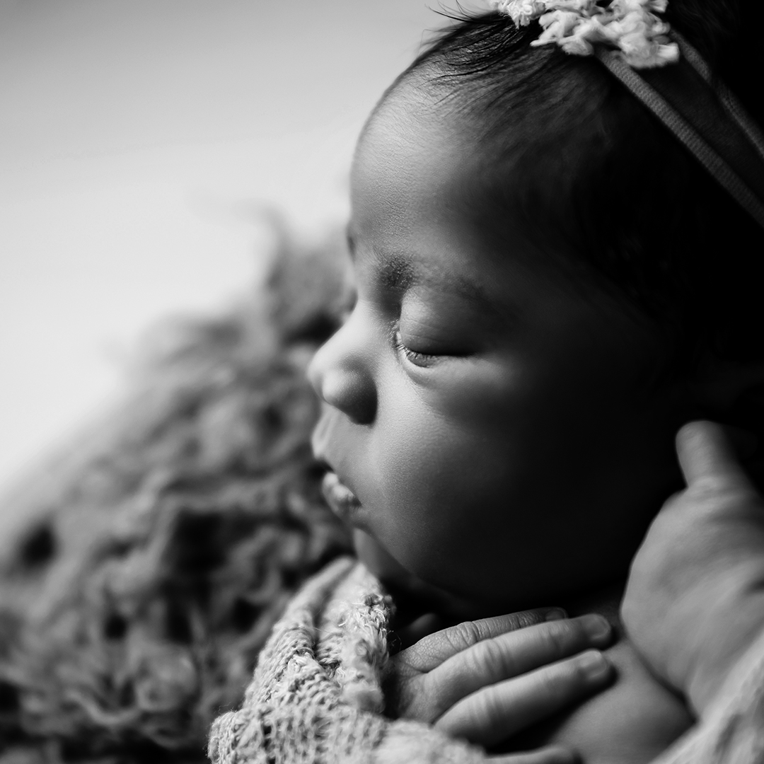 black and white macro profile image of newborn baby girl