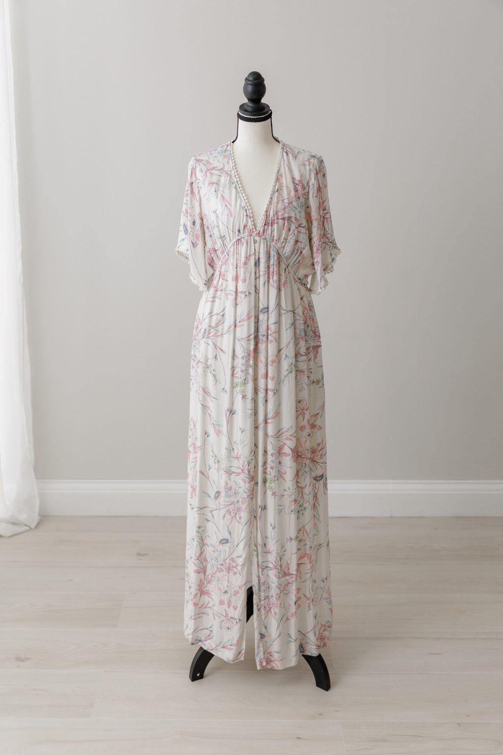 maxi dress with pink flowers for maternity or postpartum photoshoot